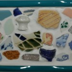 Mosaikfries aus Fundstücken